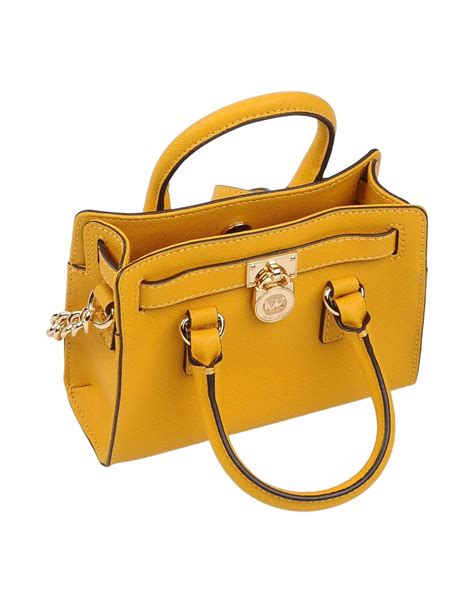 yellow michael kors purse|Michael Kors yellow crossbody purse.